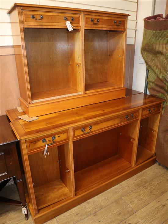 A pair of open bookcases and another similar bookcase largest W.150cm